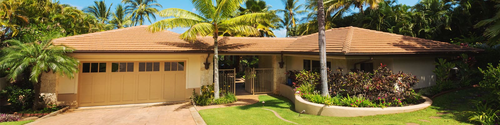 Cream house with palm trees